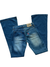 Load image into Gallery viewer, 00s mid to highwaisted flare jeans with tags on
